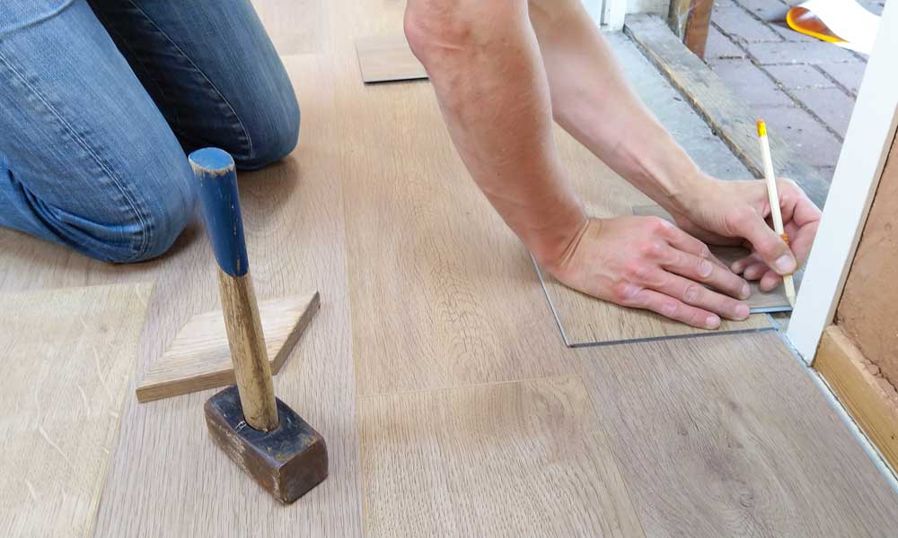 Fitting floorboards in a home renovations in Perth